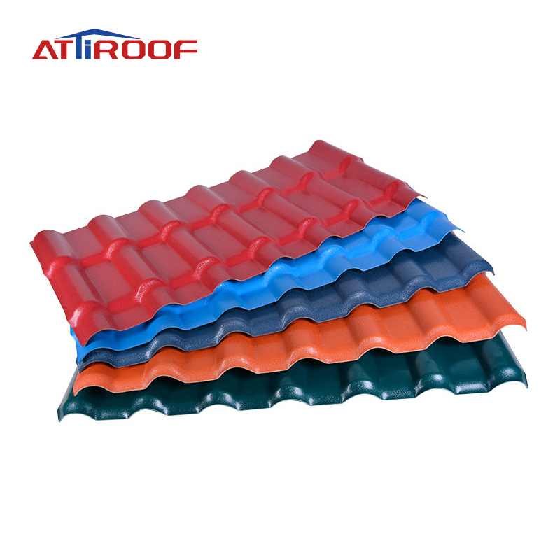 Stacked ATiROOF synthetic resin roof tiles in assorted colors red, blue, orange, and green, highlighting the durable and colorful roofing options.