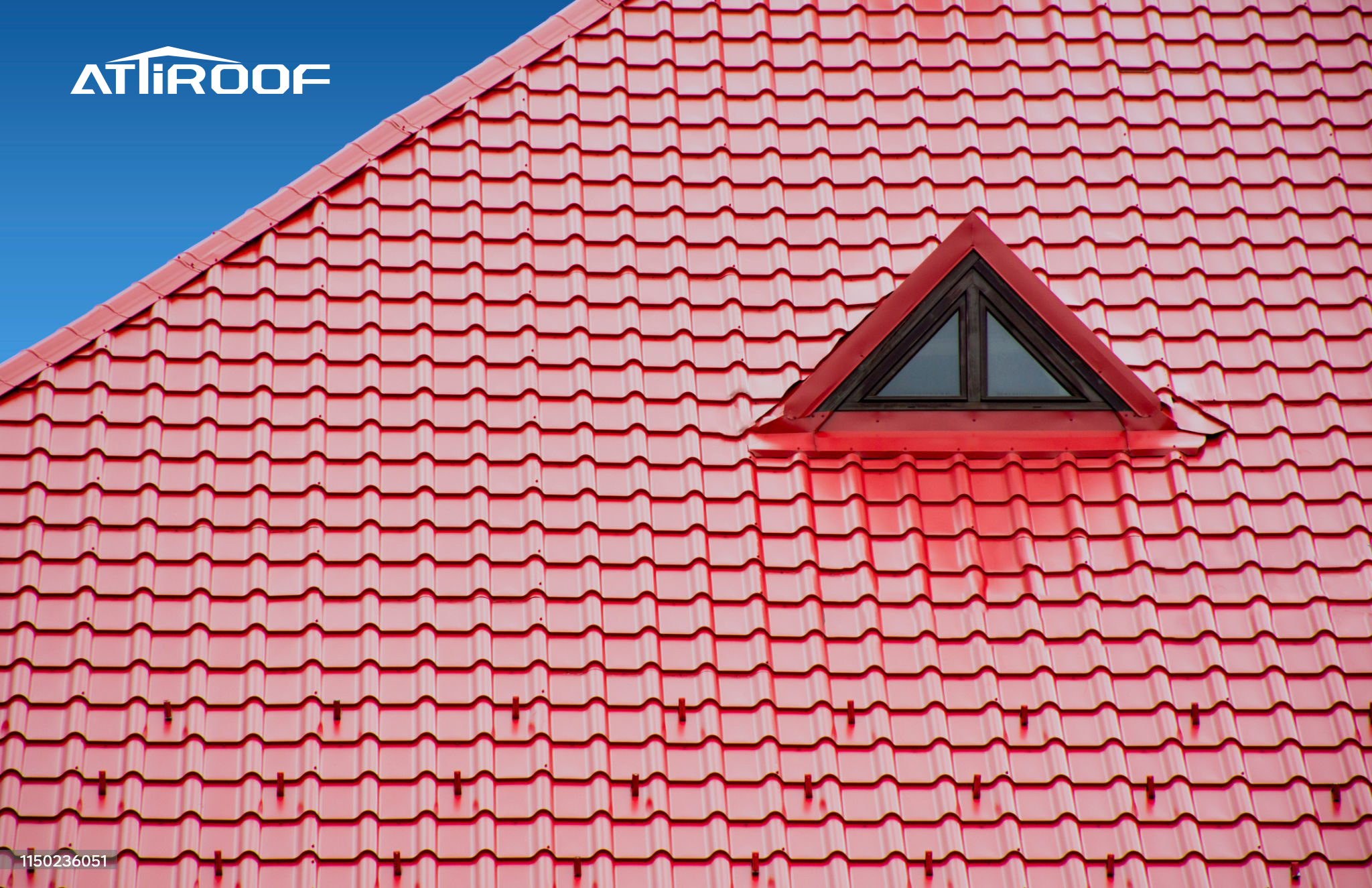 A red synthetic resin tile, with a unique triangular window on the roof and a red frame that matches the color of the tiles.